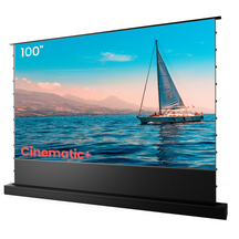 Floor-rising Cinematic+ ALR motorized projector screen showcasing a beautiful sailboat on the ocean with a 100-inch display.